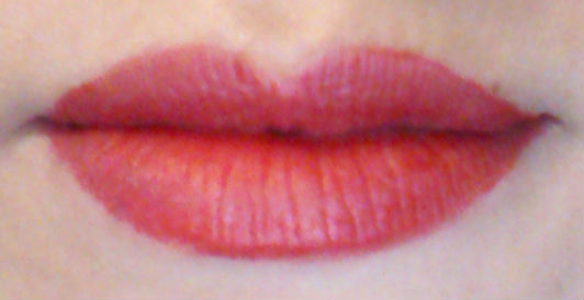 Revlon Colorstay Ultimate Liquid Lipstick Top Tomato swatch
