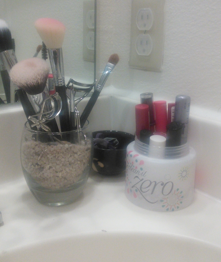 Second bathroom counter makeup and hair accessories